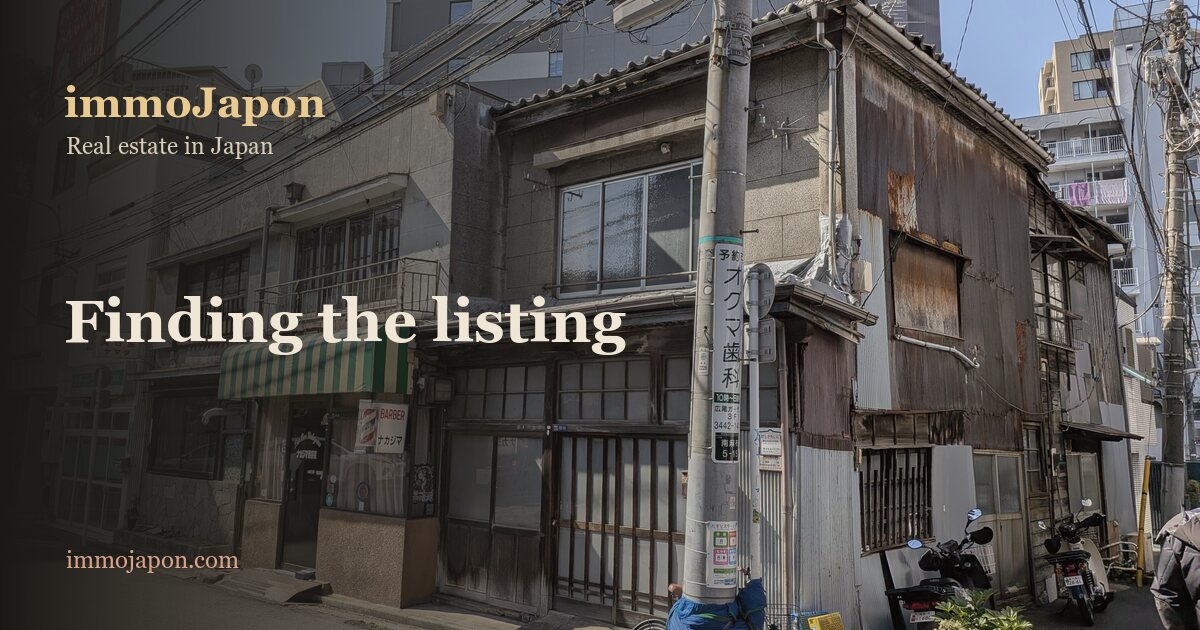 Street corner in Hiroo, Tokyo, with old wooden houses and small shops, the kind of second-hand property advertised on Japanese real estate portals