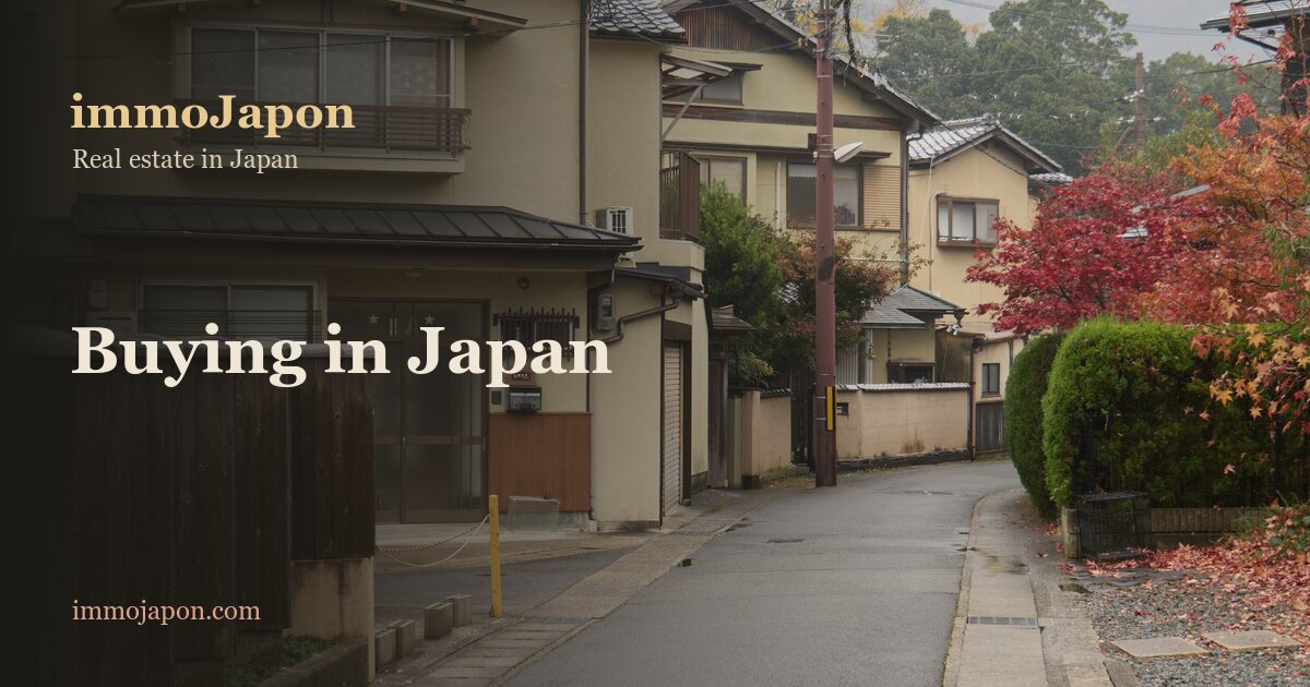 Quiet residential street in Arashiyama, Kyoto, with Japanese detached houses and a red maple